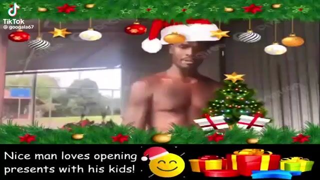 Nice man opening presents with his kids.mp4