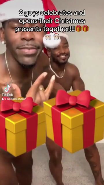 2 guys celebrate and open their christmas gifts tg.mp4